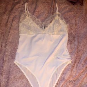 White lace body suit